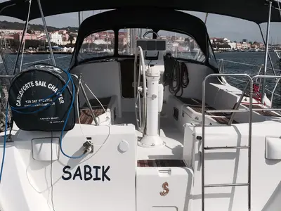 Cockpit of Sabik, a Beneteau Oceanis 393 sailboat at U Pàize, Italy