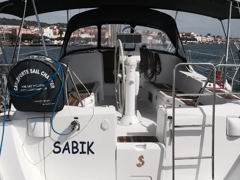 Cockpit of Sabik, a Beneteau Oceanis 393 sailboat at U Pàize, Italy