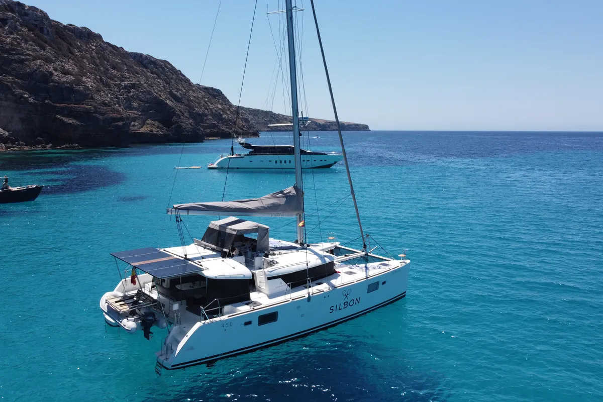Exterior view of Gran Azul, a Lagoon 450 catamaran at Santa Eulària des Riu, Spain