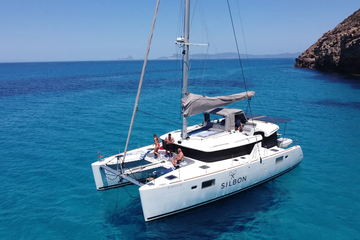 Exterior view of Gran Azul, a Lagoon 450 catamaran at Santa Eulària des Riu, Spain