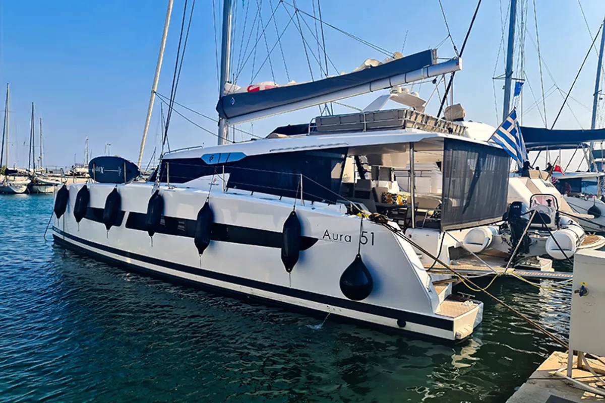 Exterior view of Penny Lane Green Wave, a Fountaine Pajot Aura 51 catamaran at Athens, Greece