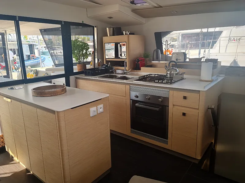 Galley of Penny Lane Green Wave, a Fountaine Pajot Aura 51 catamaran at Athens, Greece