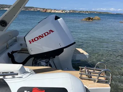 NN, a Altamarea Wave 23 Sport RIB at Cannigione, Italy