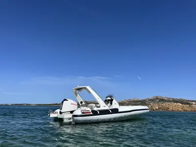NN, a Altamarea Wave 23 Sport RIB at Cannigione, Italy