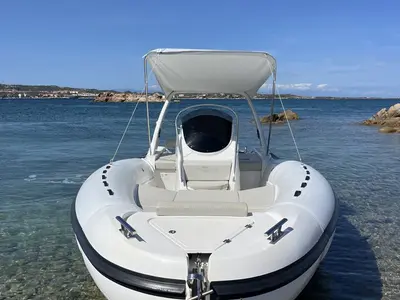 NN, a Altamarea Wave 23 Sport RIB at Cannigione, Italy