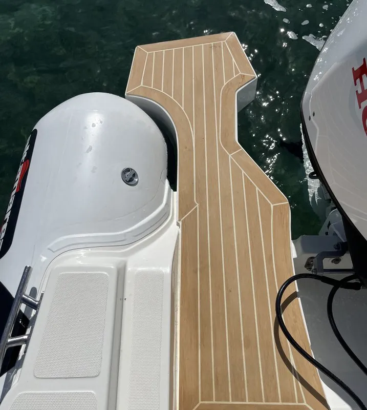 NN, a Altamarea Wave 23 Sport RIB at Cannigione, Italy
