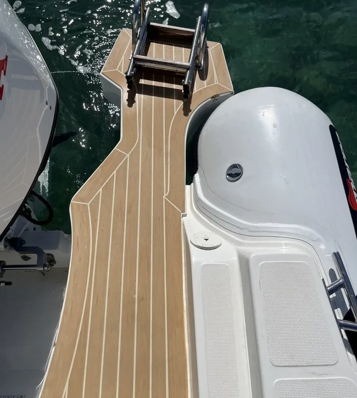 NN, a Altamarea Wave 23 Sport RIB at Cannigione, Italy