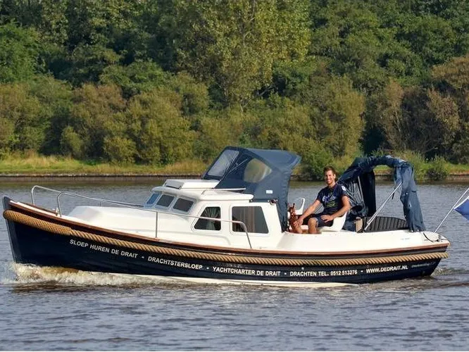 Exterior view of Drait 153, a De Drait Drachtster Sloep Cabin 750 motorboat at Drachten, Netherlands