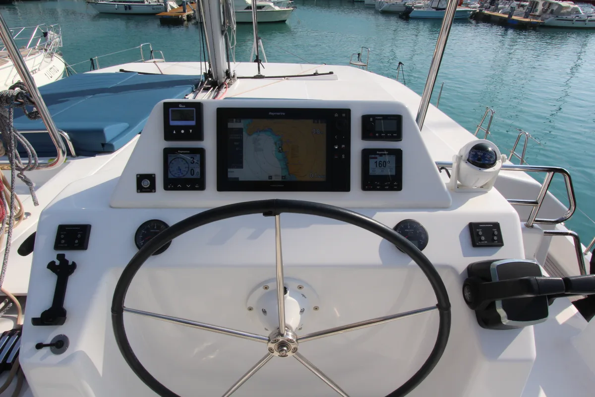 Cockpit of Lublu, a Dufour Catamaran 48 catamaran at Olbia, Italy