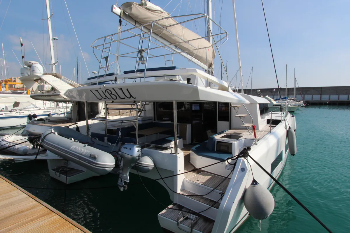 Exterior view of Lublu, a Dufour Catamaran 48 catamaran at Olbia, Italy