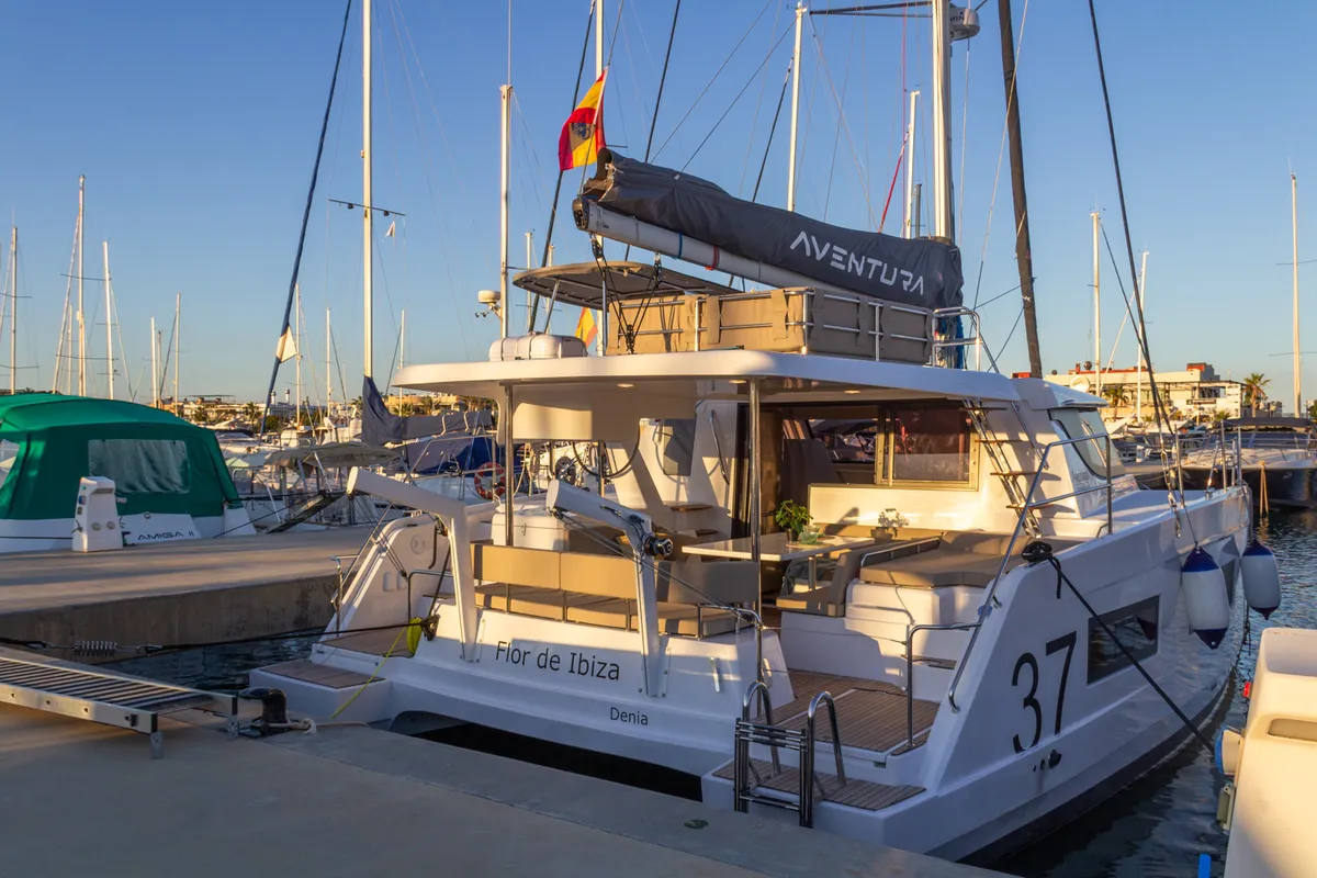 Exterior view of Flor de Ibiza, a Aventura 37 catamaran at Dénia, Spain
