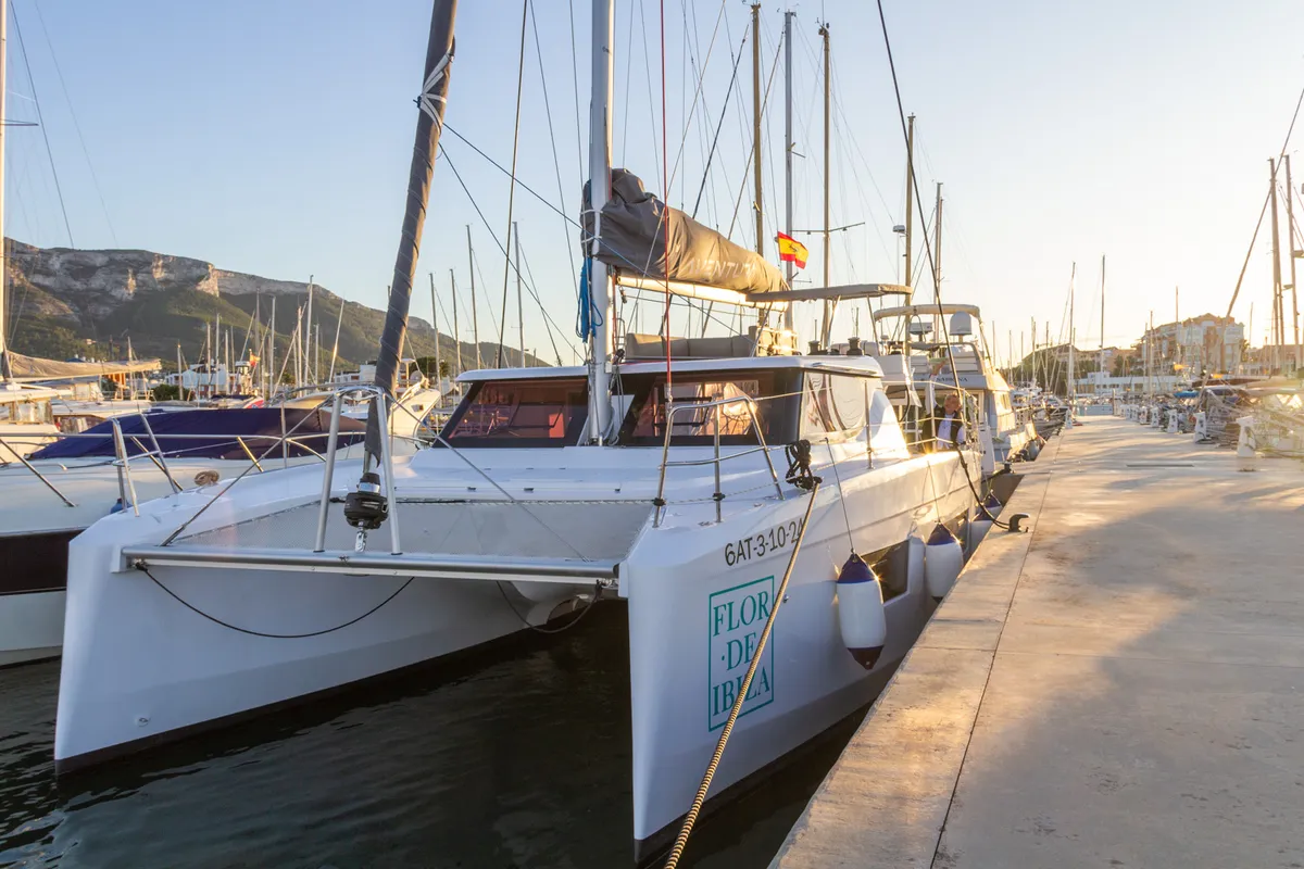 Exterior view of Flor de Ibiza, a Aventura 37 catamaran at Dénia, Spain