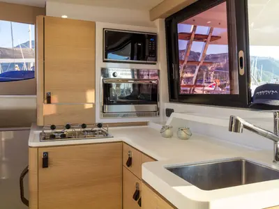 Galley of Flor de Ibiza, a Aventura 37 catamaran at Dénia, Spain