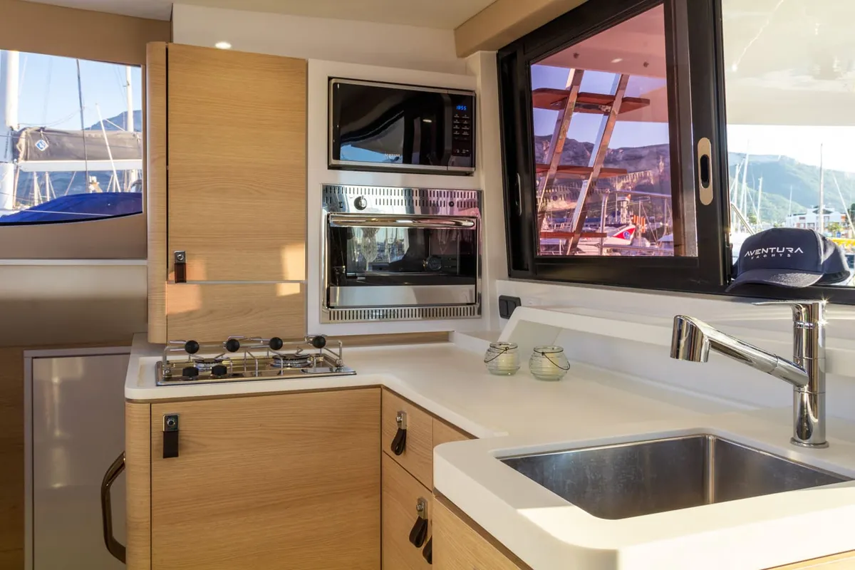 Galley of Flor de Ibiza, a Aventura 37 catamaran at Dénia, Spain