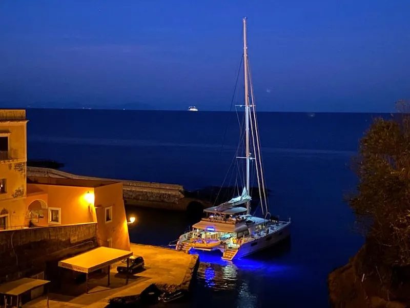 Exterior view of Lady Rachel, a Lagoon 620 catamaran at Procida, Italy