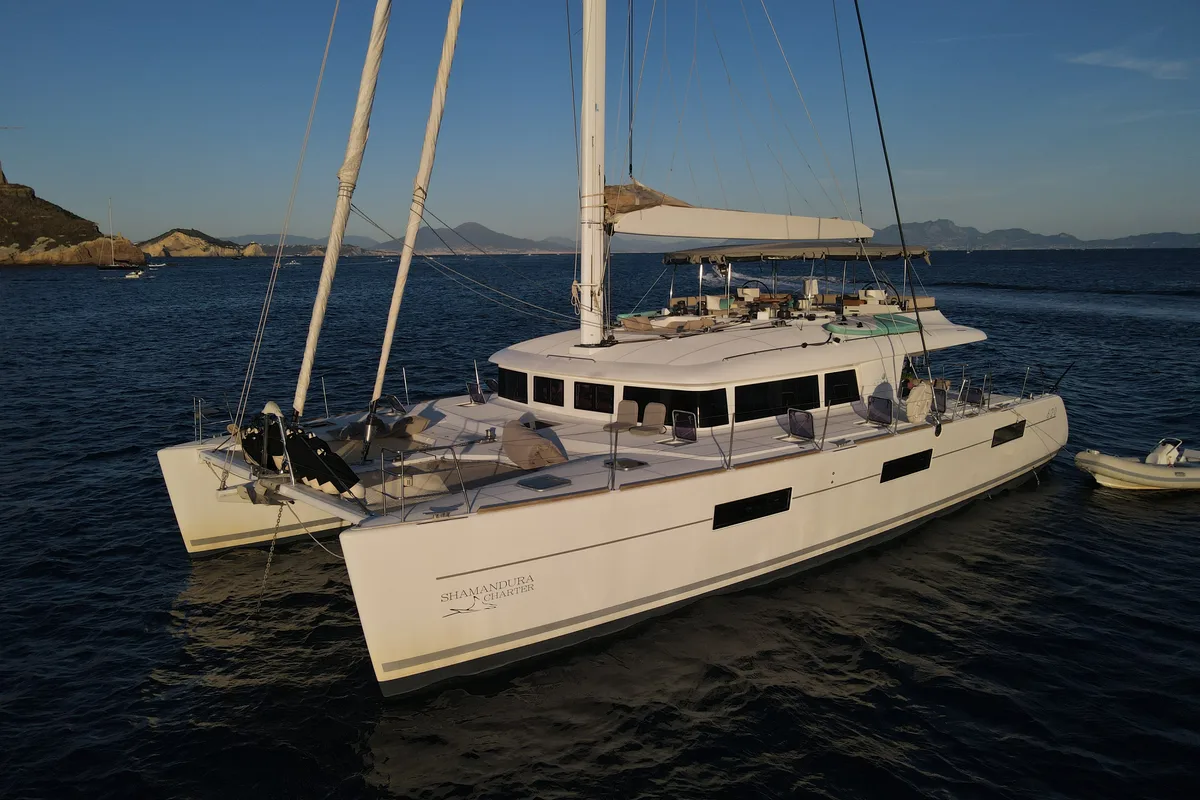 Exterior view of Lady Rachel, a Lagoon 620 catamaran at Procida, Italy