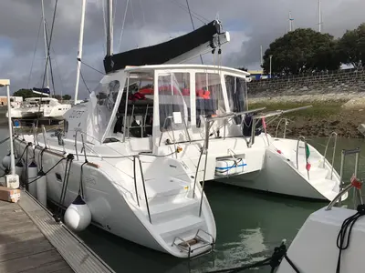 Exterior view of Naos, a Lagoon 380 catamaran at Olbia, Italy