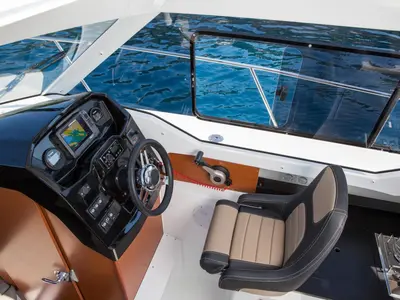 Cockpit of Merry Fisher 795, a Jeanneau Merry Fisher 795 motorboat at Grad Trogir, Croatia