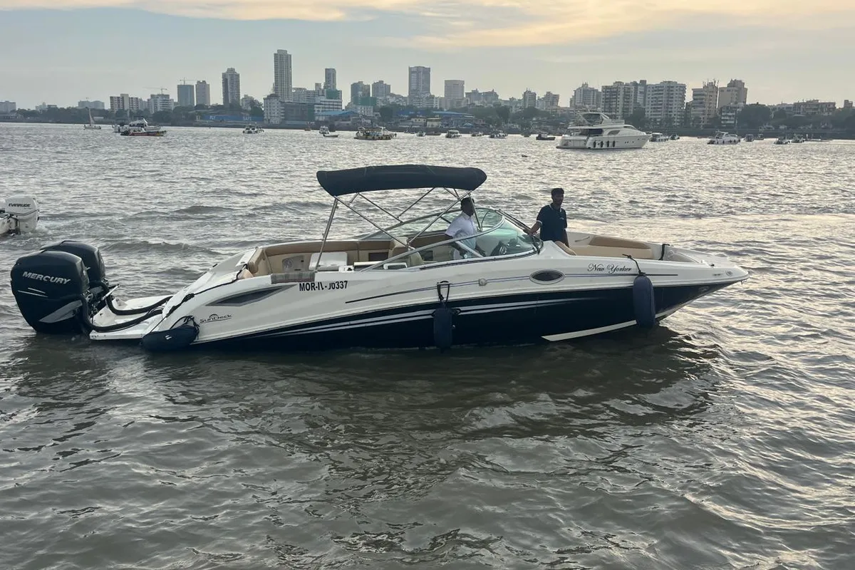 Exterior view of New Yorker, a Sea Ray SDX 290 motorboat at Mumbai Harbour, India