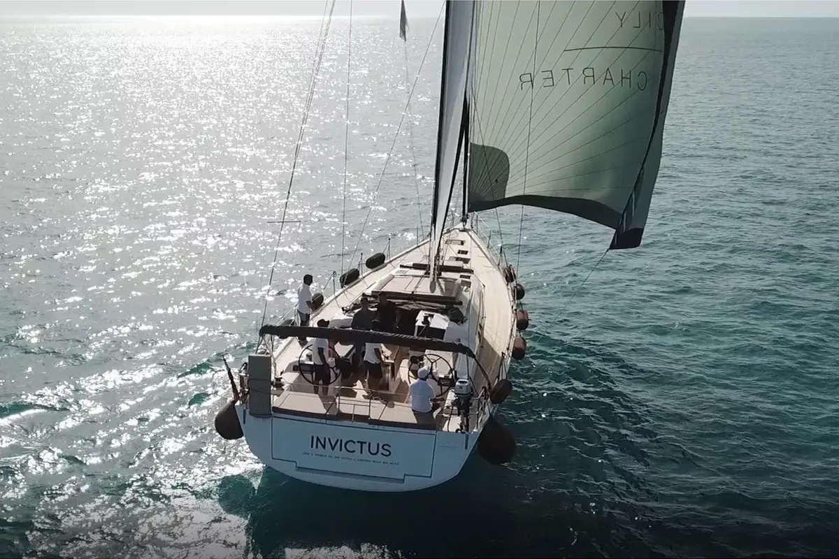 Exterior view of INVICTUS, a Dufour 56 Exclusive sailboat at Capo d'Orlando, Italy