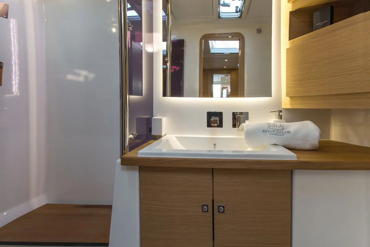 Head on INVICTUS, a Dufour 56 Exclusive sailboat at Capo d'Orlando, Italy