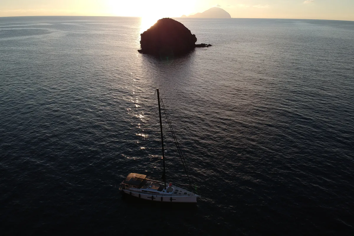 Exterior view of INVICTUS, a Dufour 56 Exclusive sailboat at Capo d'Orlando, Italy