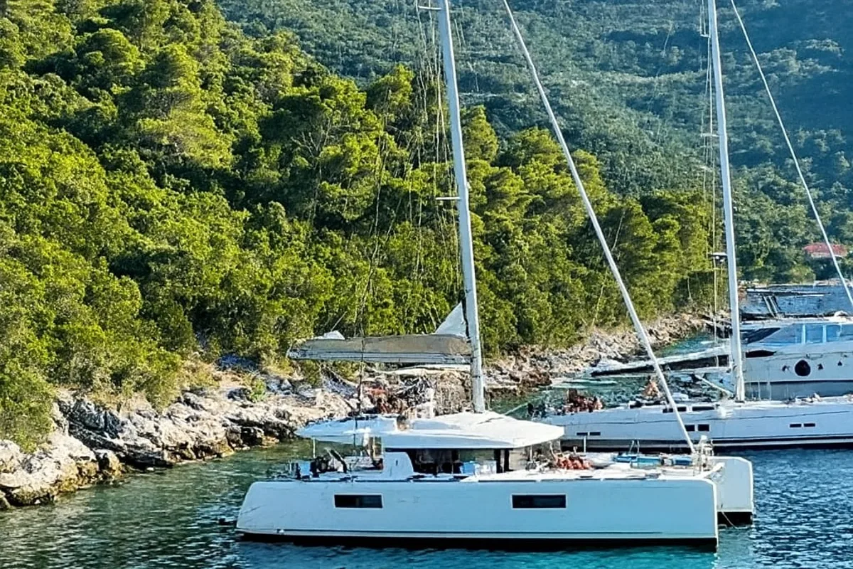Exterior view of Orion Star, a Lagoon 52 catamaran at Skiathos, Greece