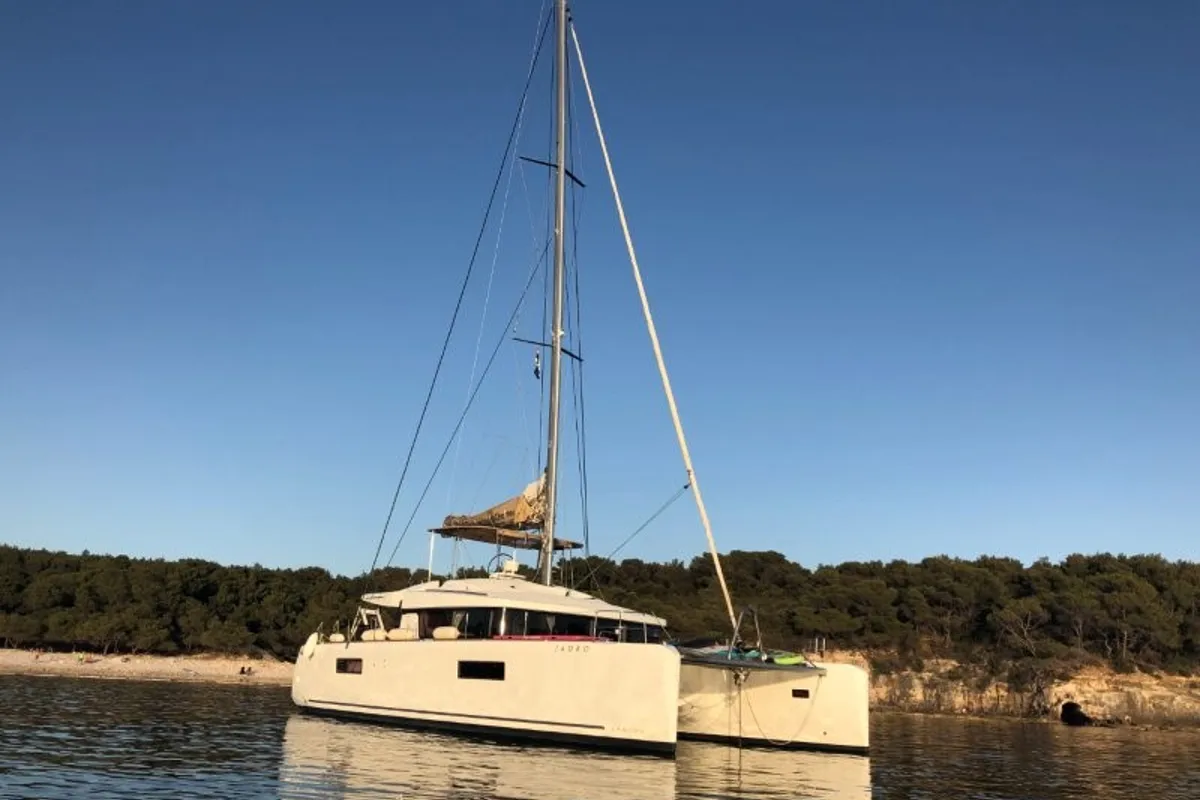 Exterior view of Orion Star, a Lagoon 52 catamaran at Skiathos, Greece