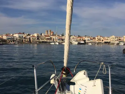 Exterior view of Wind of Change, a Beneteau Oceanis 37 sailboat at Parikia, Greece