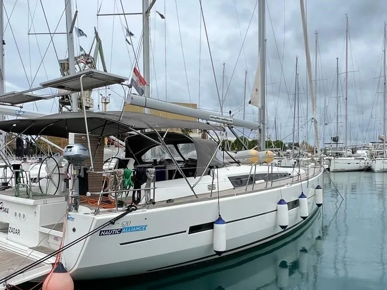 Exterior view of Valle d'Aosta, a Dufour 520 Grand Large sailboat at Piombino, Italy