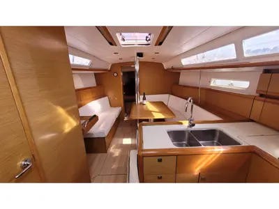 Salon of Grenat, a Jeanneau Sun Odyssey 379 sailboat at Saint-Cast-le-Guildo, France