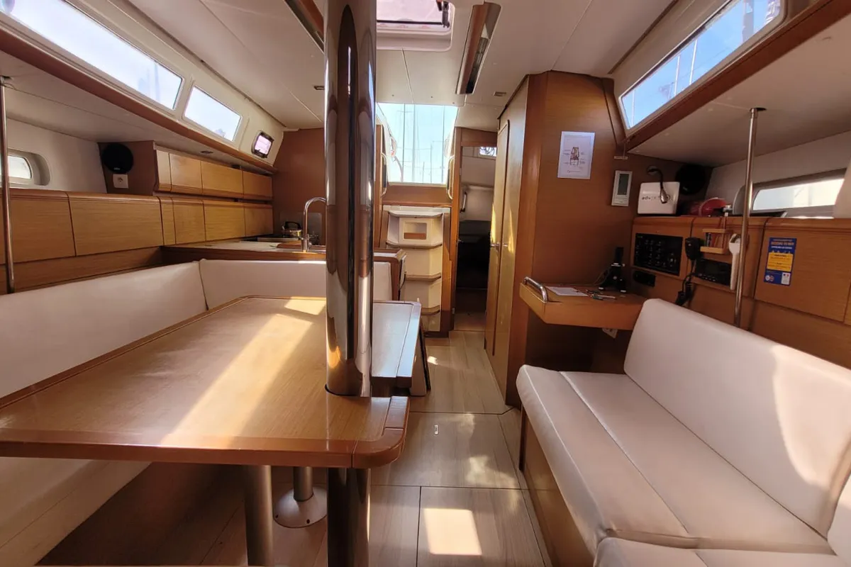 Salon of Grenat, a Jeanneau Sun Odyssey 379 sailboat at Saint-Cast-le-Guildo, France