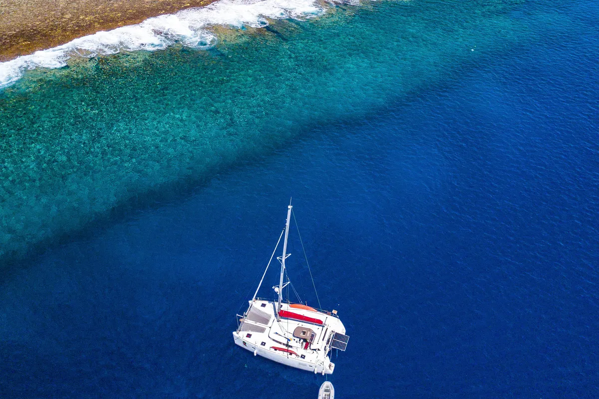 Exterior view of Poe Reva, a Lagoon 400 S2 catamaran at Papeete, France