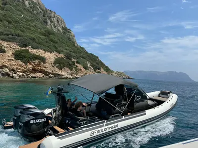 Exterior view of Goldfinger, a Brig Eagle 10 RIB at Figari, Italy