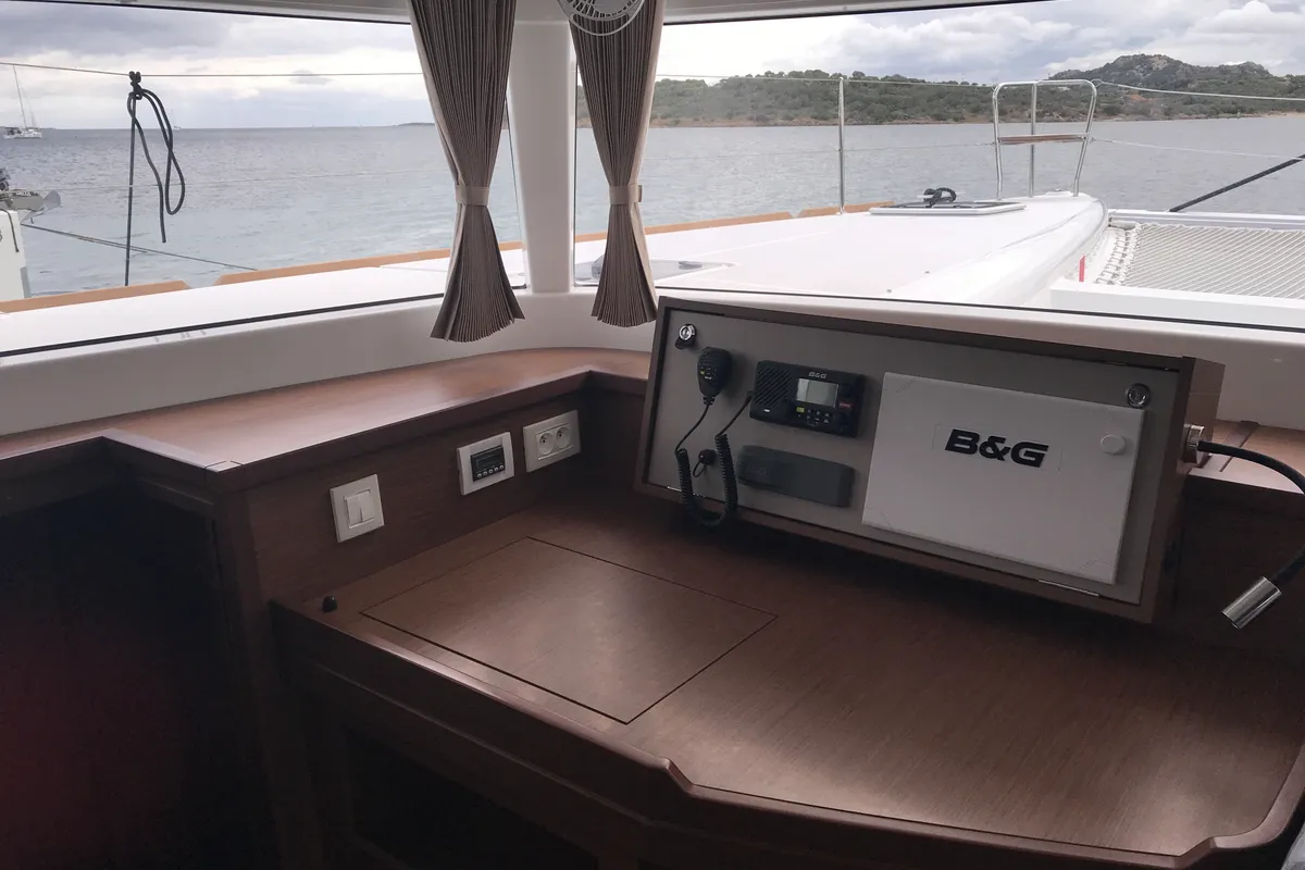 Salon of Rigel Kentaurus, a Lagoon 450 Fly catamaran at Olbia, Italy