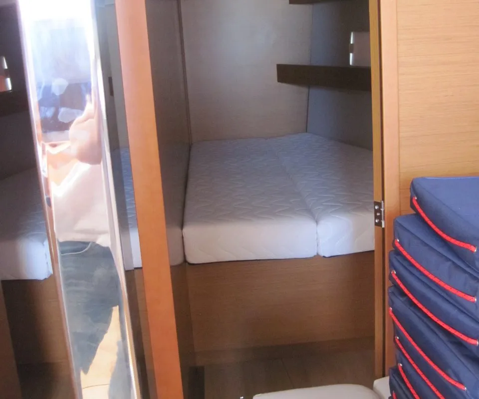 Cabin on Erminia, a Jeanneau Sun Odyssey 440 sailboat at Capo d'Orlando, Italy