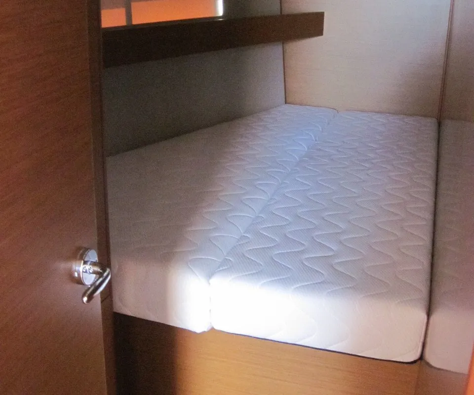 Cabin on Erminia, a Jeanneau Sun Odyssey 440 sailboat at Capo d'Orlando, Italy