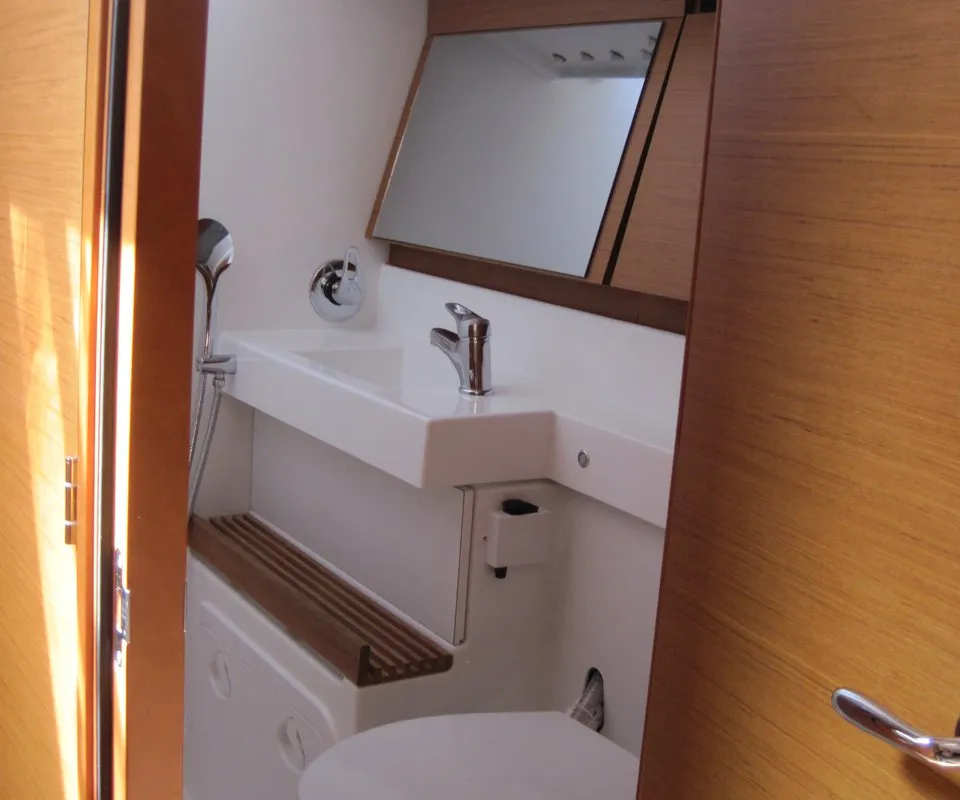 Head on Erminia, a Jeanneau Sun Odyssey 440 sailboat at Capo d'Orlando, Italy