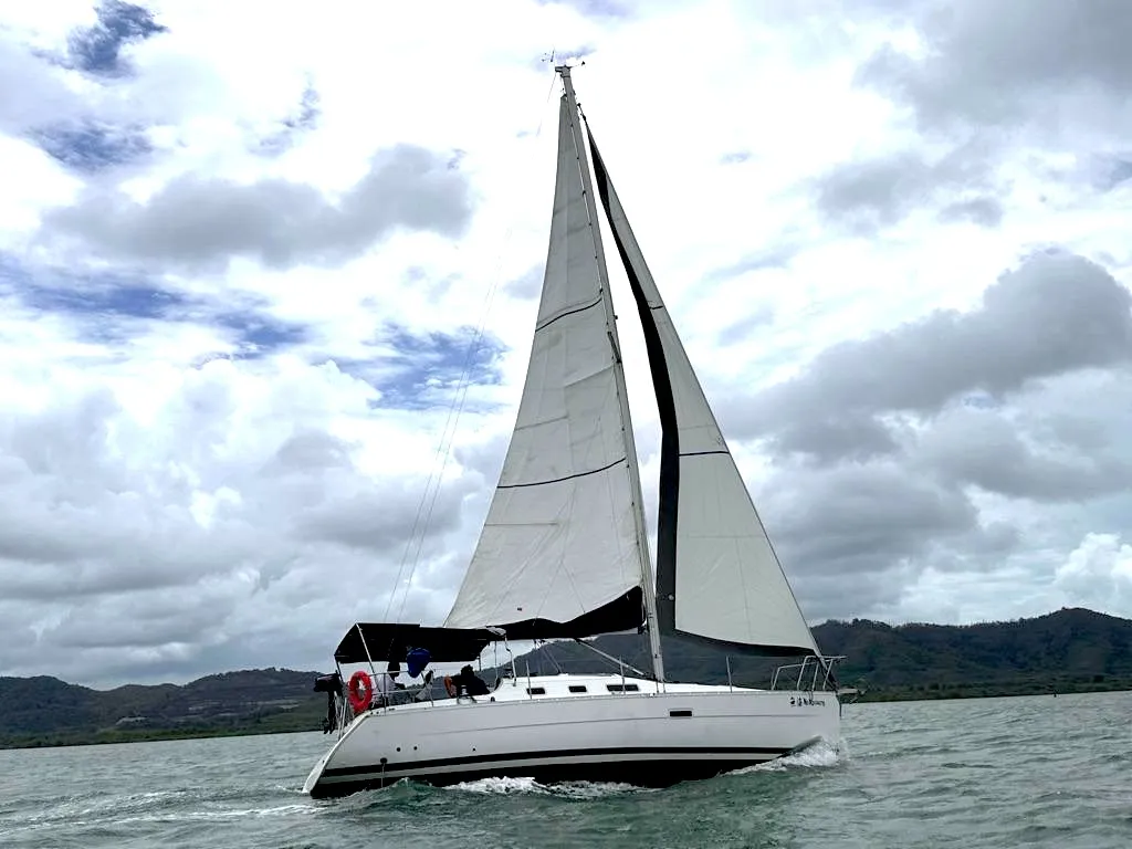 Exterior view of No regrets, a Beneteau Oceanis Clipper 323 sailboat at Mai Khao, Thailand