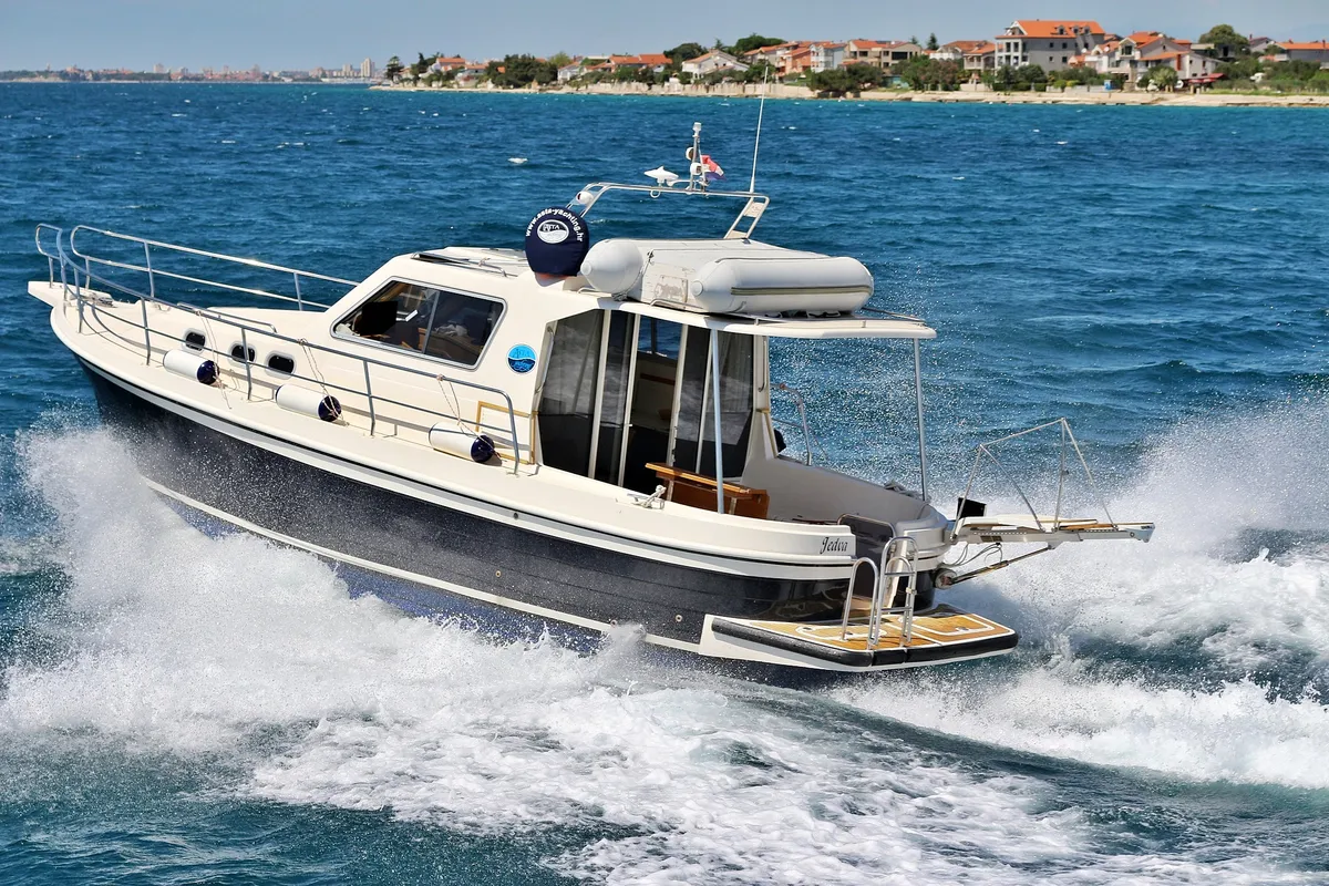Exterior view of Jedva, a SAS - Vektor Adria 1002 Vektor motorboat at Općina Sukošan, Croatia