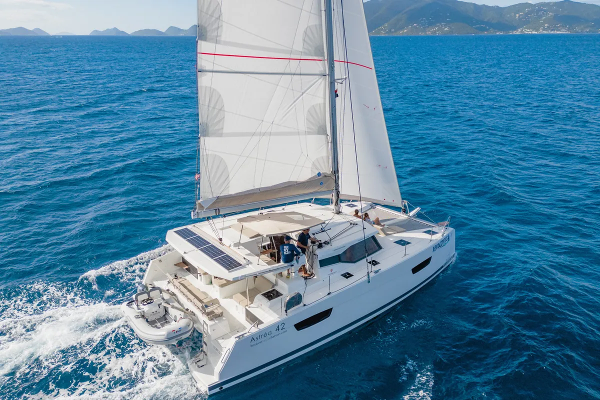 Exterior view of Rendezvous III, a Fountaine Pajot Astrea 42 catamaran at Road Town, British Virgin Islands