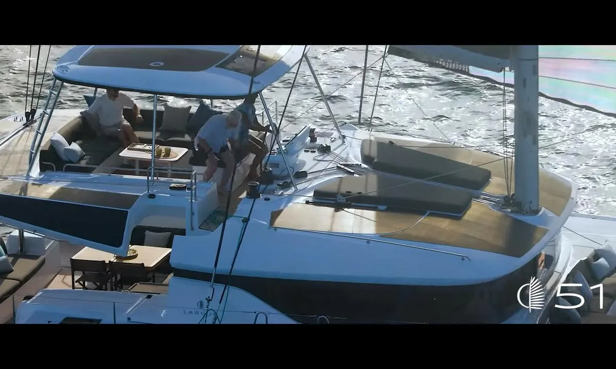 Exterior view of Deb Elli, a Lagoon 51 catamaran at Sant Antoni de Portmany, Spain