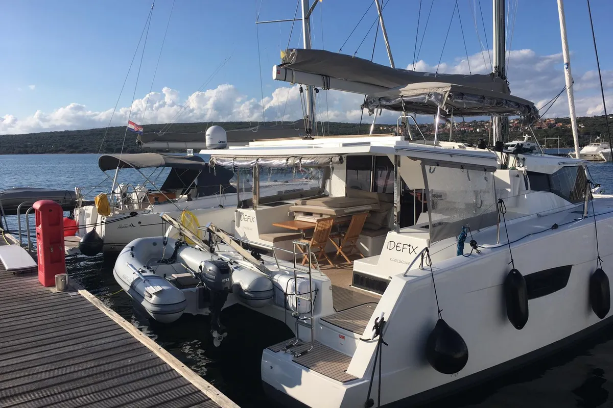 Exterior view of Idefix, a Fountaine Pajot Lucia 40 catamaran at Općina Rogoznica, Croatia