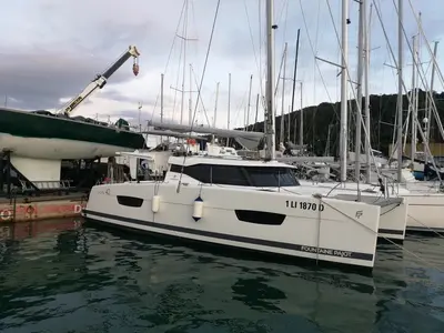 Exterior view of Ines, a Fountaine Pajot Lucia 40 catamaran at Olbia, Italy