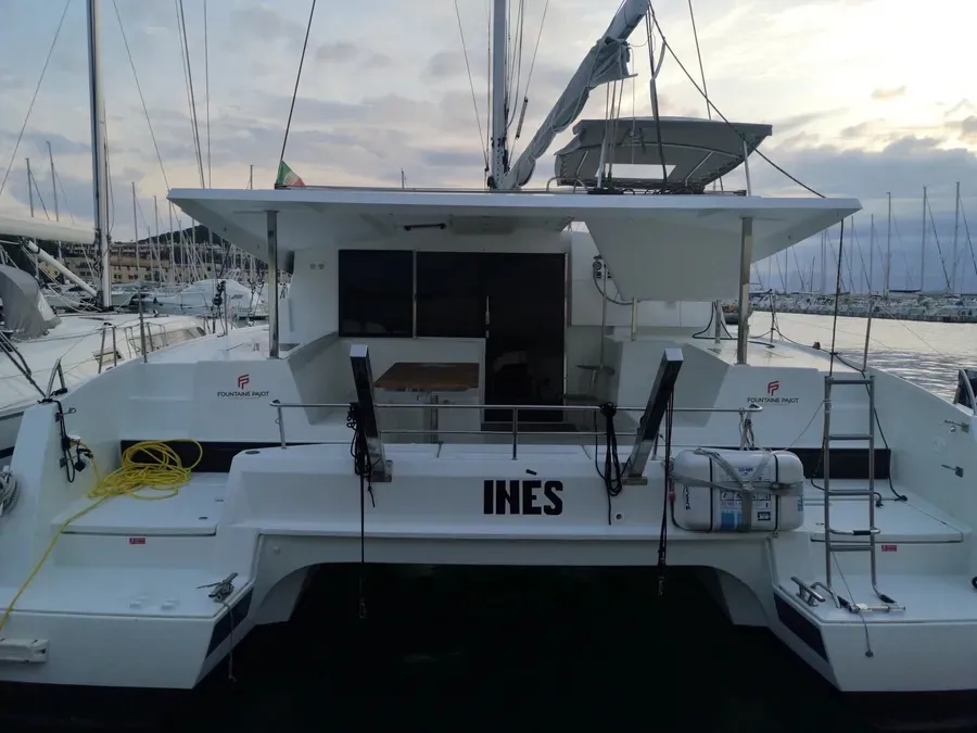 Exterior view of Ines, a Fountaine Pajot Lucia 40 catamaran at Olbia, Italy