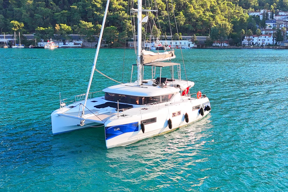 Exterior view of Lua, a Lagoon 46 catamaran at Fethiye, Turkey
