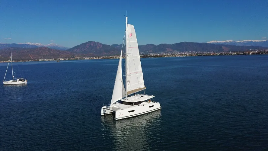 Exterior view of Gloria, a Fountaine Pajot Astrea 42 catamaran at Fethiye, Turkey
