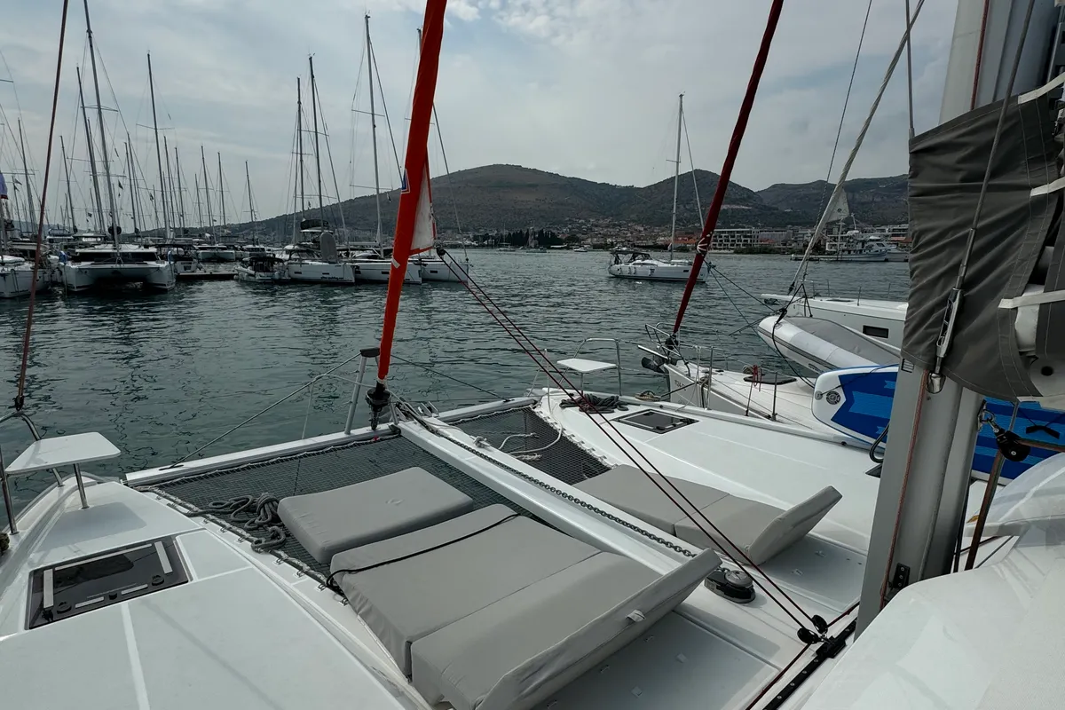 Deck of White Ivy, a Excess 11 - 4 + 1 + 1 cab. catamaran at Grad Trogir, Croatia