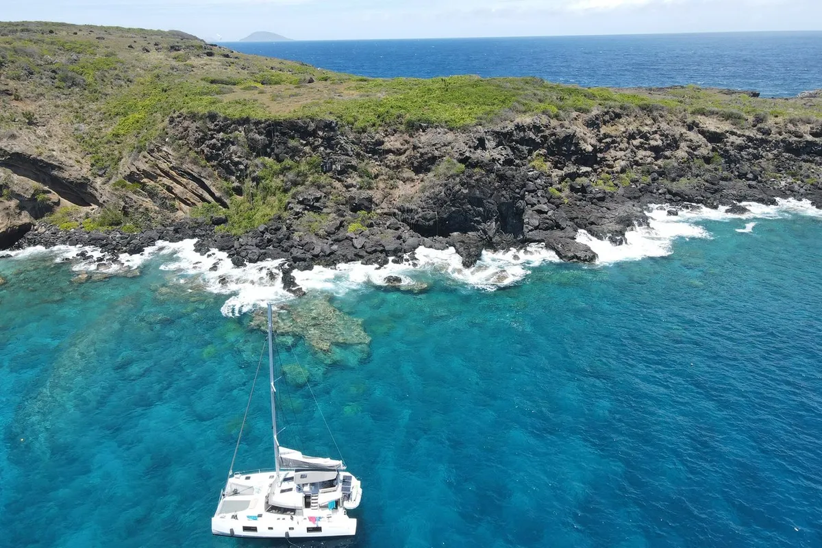 Exterior view of Sea Spirit II, a Nautitech 46 Fly catamaran at Grande Rivière Noire VCA, Mauritius