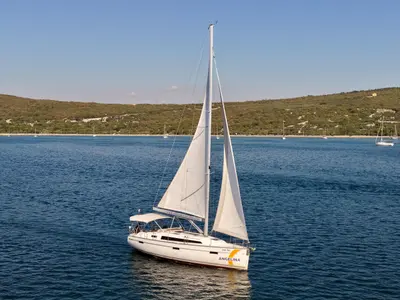 Exterior view of Bura, a Bavaria Cruiser 37 sailboat at Punat, Croatia